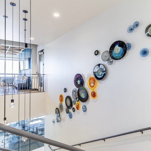 colourful blown glass wall art disks